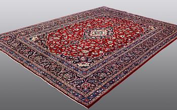 A carpet, Mashad, ca 346 x 248 cm.
