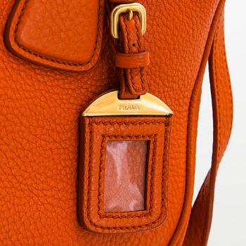 Prada, a 'Vitello Daino Tote' bag.