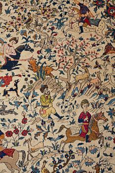 A CARPET, a semi-antique Teheran probably, a figural part silk, ca 347,5-345,5 x 242 cm.