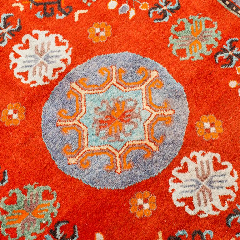 A russian or East Turkestan rug, around 224 x 130 cm.