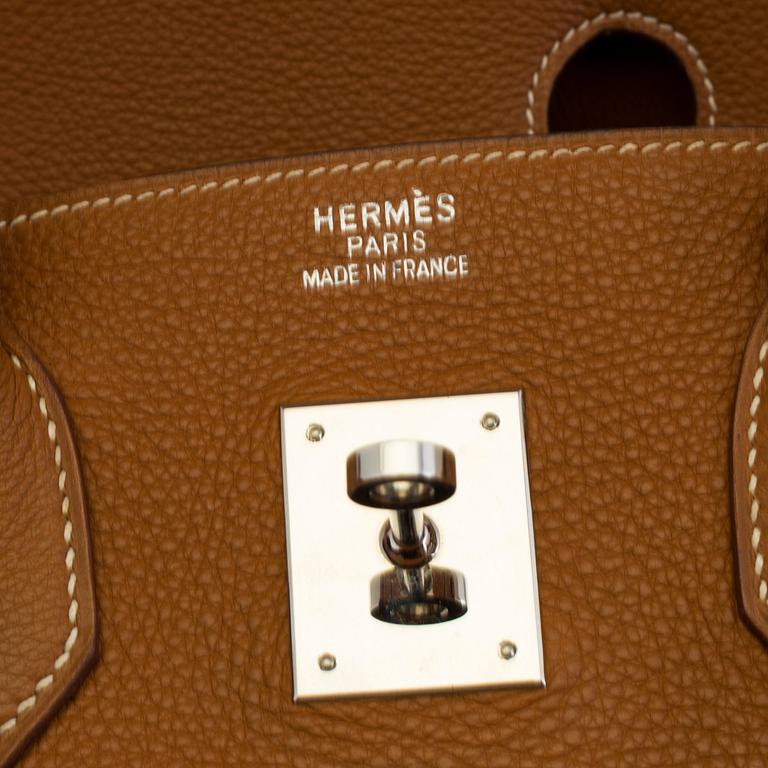 A gold togo Birkin 35 handbag by Hermès from 2004.