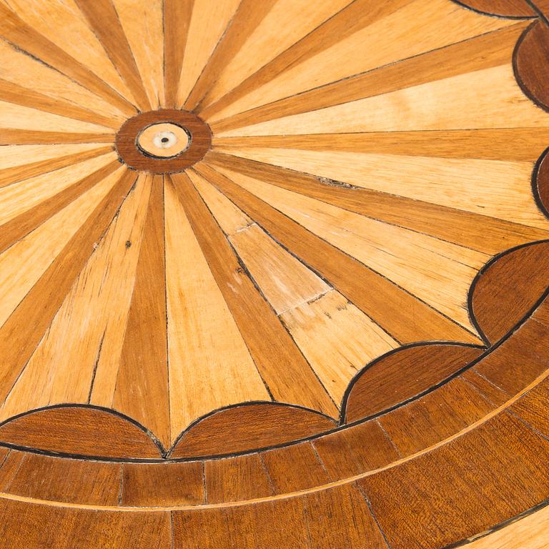 A tilt top table from 19th Century.