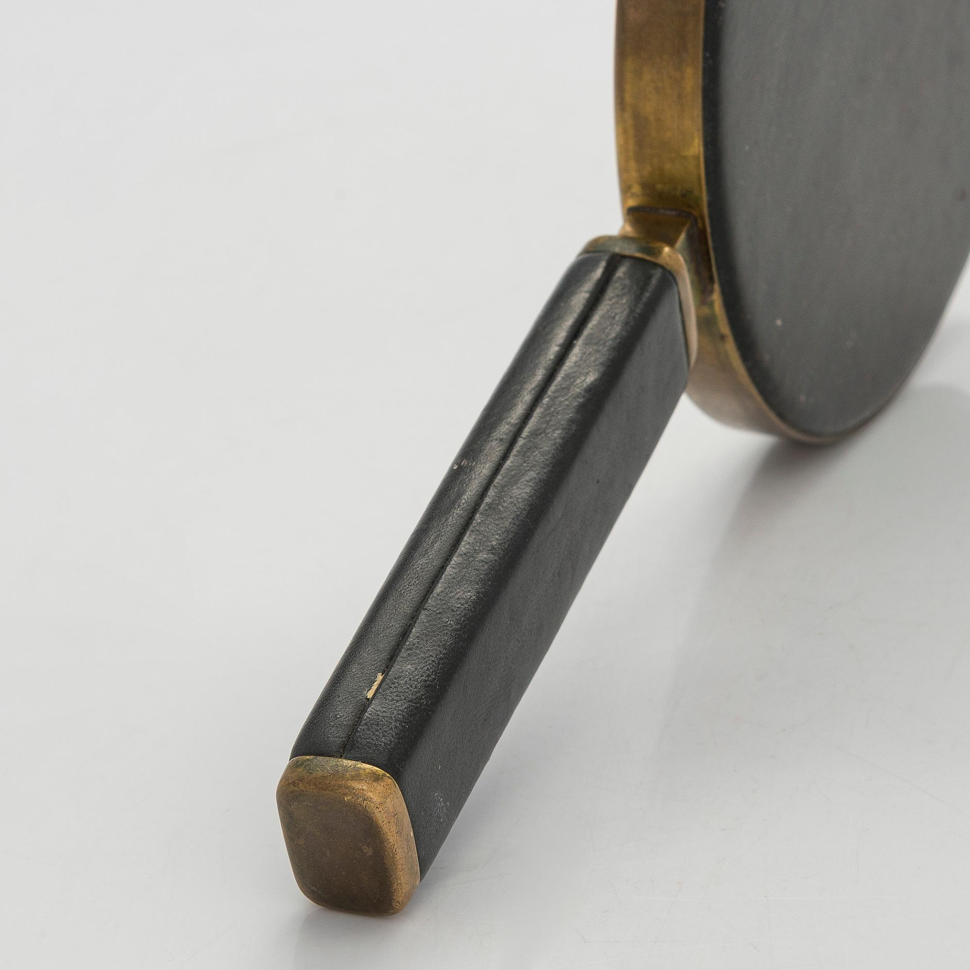 Maija Heikinheimo, A 1960s hand mirror for Valaistustyö, Finland.