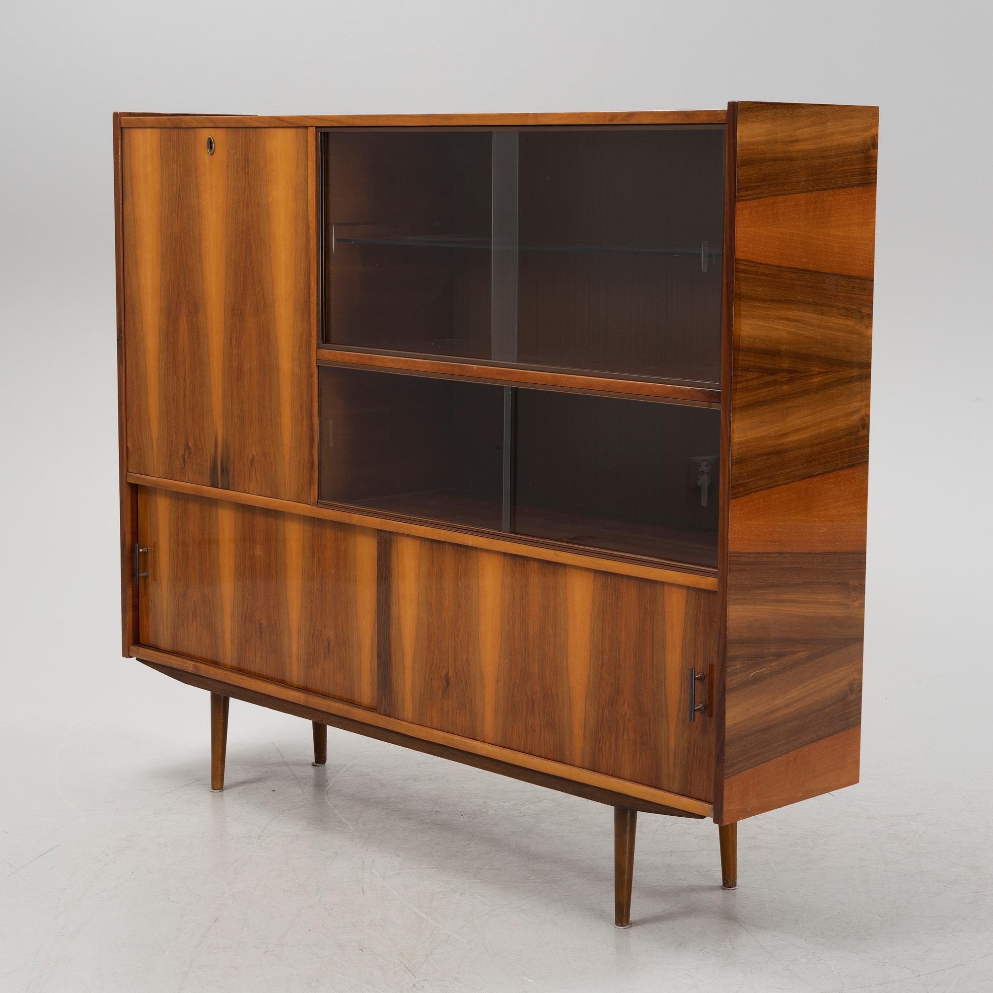 A walnut veneered cabinet, 1950's/60's.