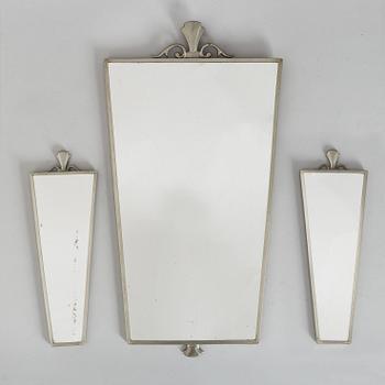 A 1930's mirror and a pair of sconces.