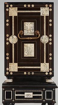 An Italien Baroque-style 19th century cabinet on stand.