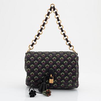 Marc Jacobs, a qulited leather handbag.