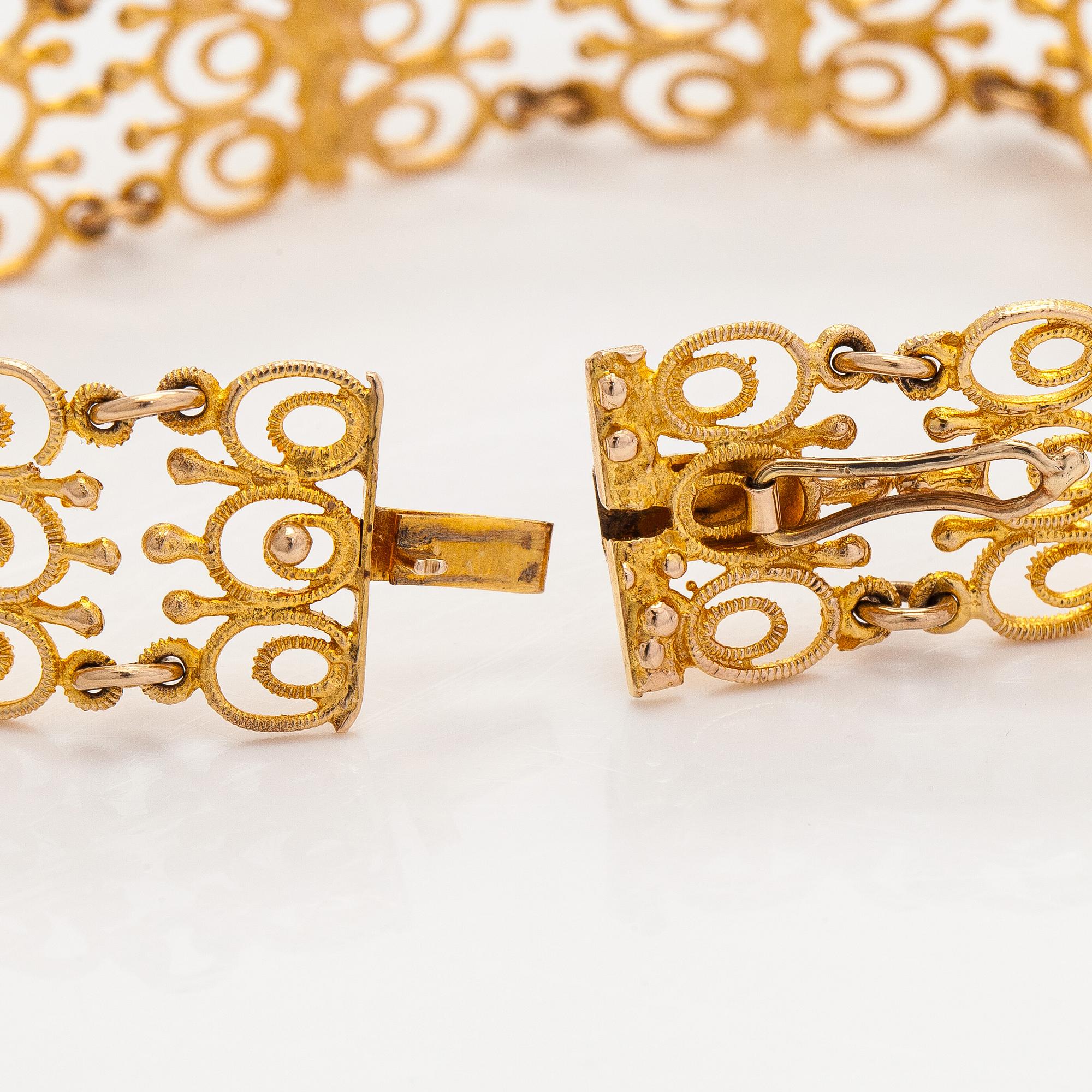 Esko Raitanen, collier, armband och örhängen, 14K guld, Helsingfors 1972.