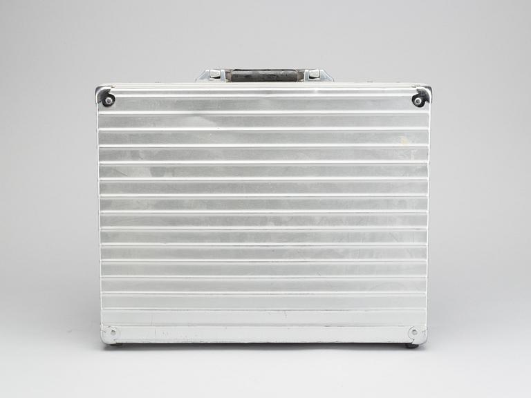 A set of three Rimowa bags later part of the 20th century.