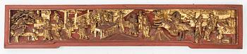 A carved wooden relief, China, late Qing dynasty, late 19th century.