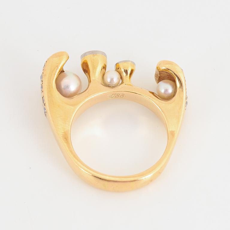 Brilliant-cut diamond and pearl ring.