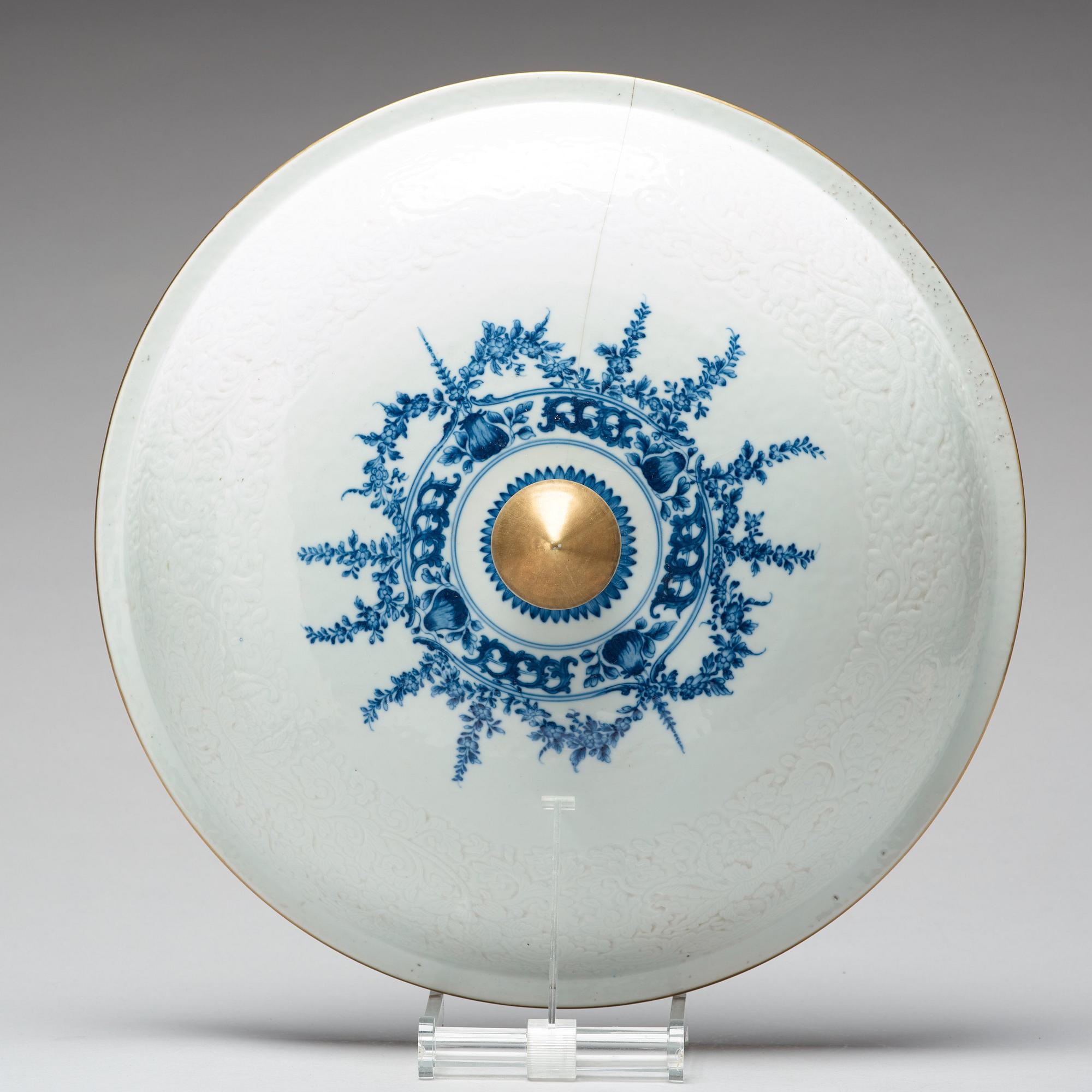 A large blue and white armorial punch bowl with cover, Qing dynasty, Qianlong (1736-95).