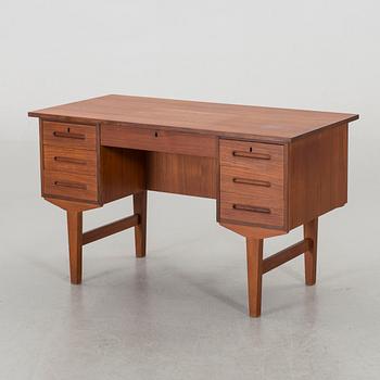 A MID 20TH CENTURY WRITING DESK.