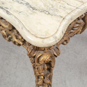 A second half of the 20th Century bronzed table with a marble top.