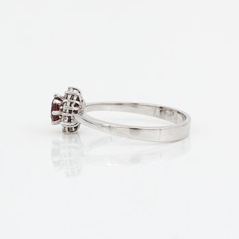 RING, 14K vitguld med fasettslipad turmalin och diamanter 0,15 ct. Vikt 2,5 gram.