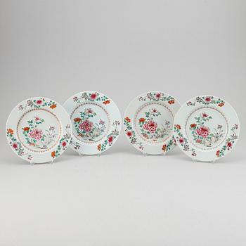 A set of four famille rose dinner plates, Qing dynasty, Qianlong (1736-95).