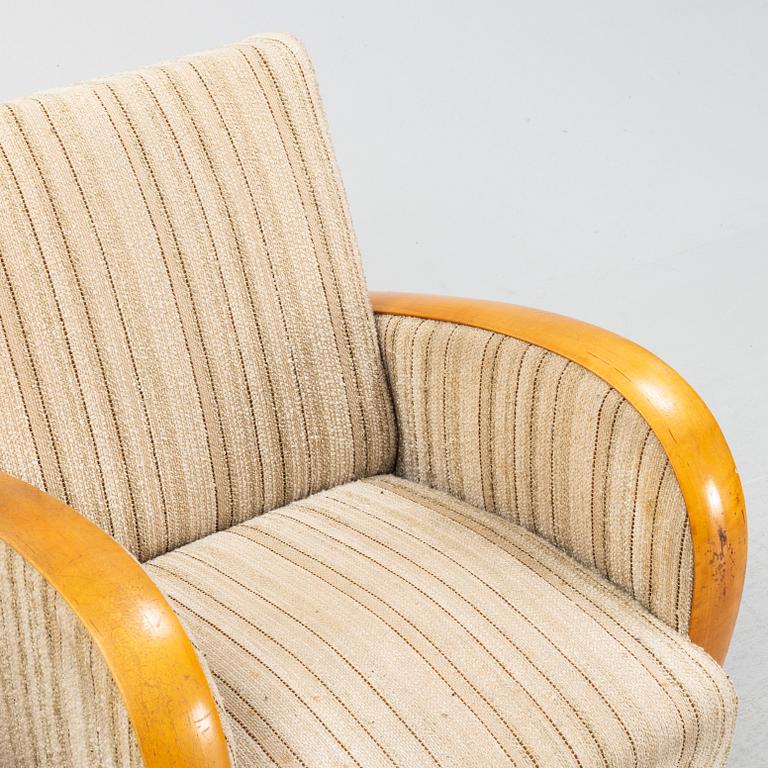 A pair of Swedish Modern easy chairs, Dux T-serie, 1940's/50's.