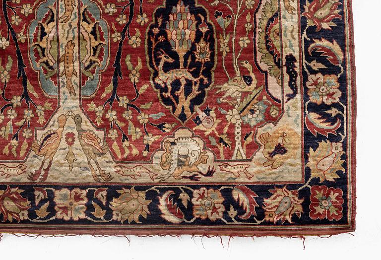 An antique Anatolian silk rug, c. 183 x 120 cm.
