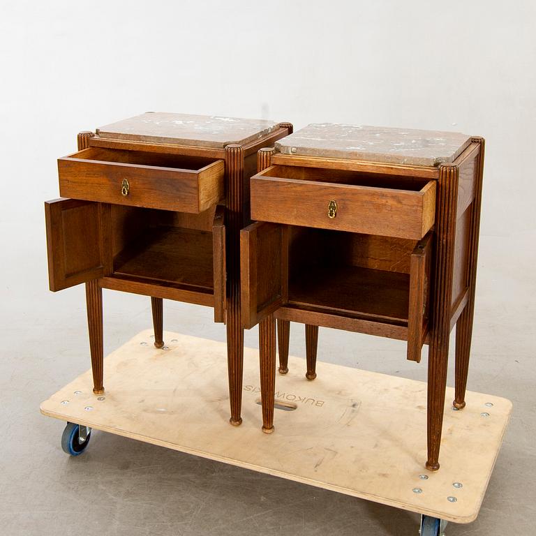 A pair of oak bedside tables beginning of the 20th century.