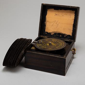 A GERMAN MUSICAL BOX, with 23 songs, 19th century.