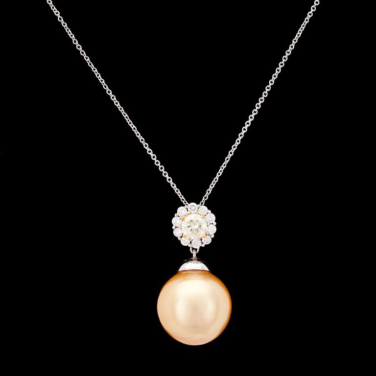 A cultured golden South sea pearl, 15 mm, and brilliant cut diamond pendant.