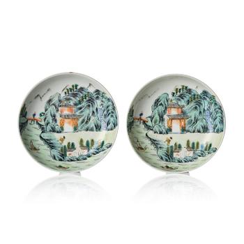 838. A pair of enamelled landscape dishes, Qing dynasty, seal mark in red Xianfeng (1909-11) and of the period.