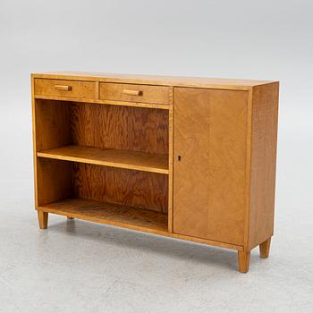 A bookcase with cabinet, 1930s.