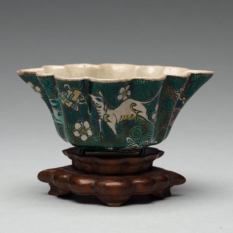 A famille verte bisquit cup, Qing dynasty, 17th century.