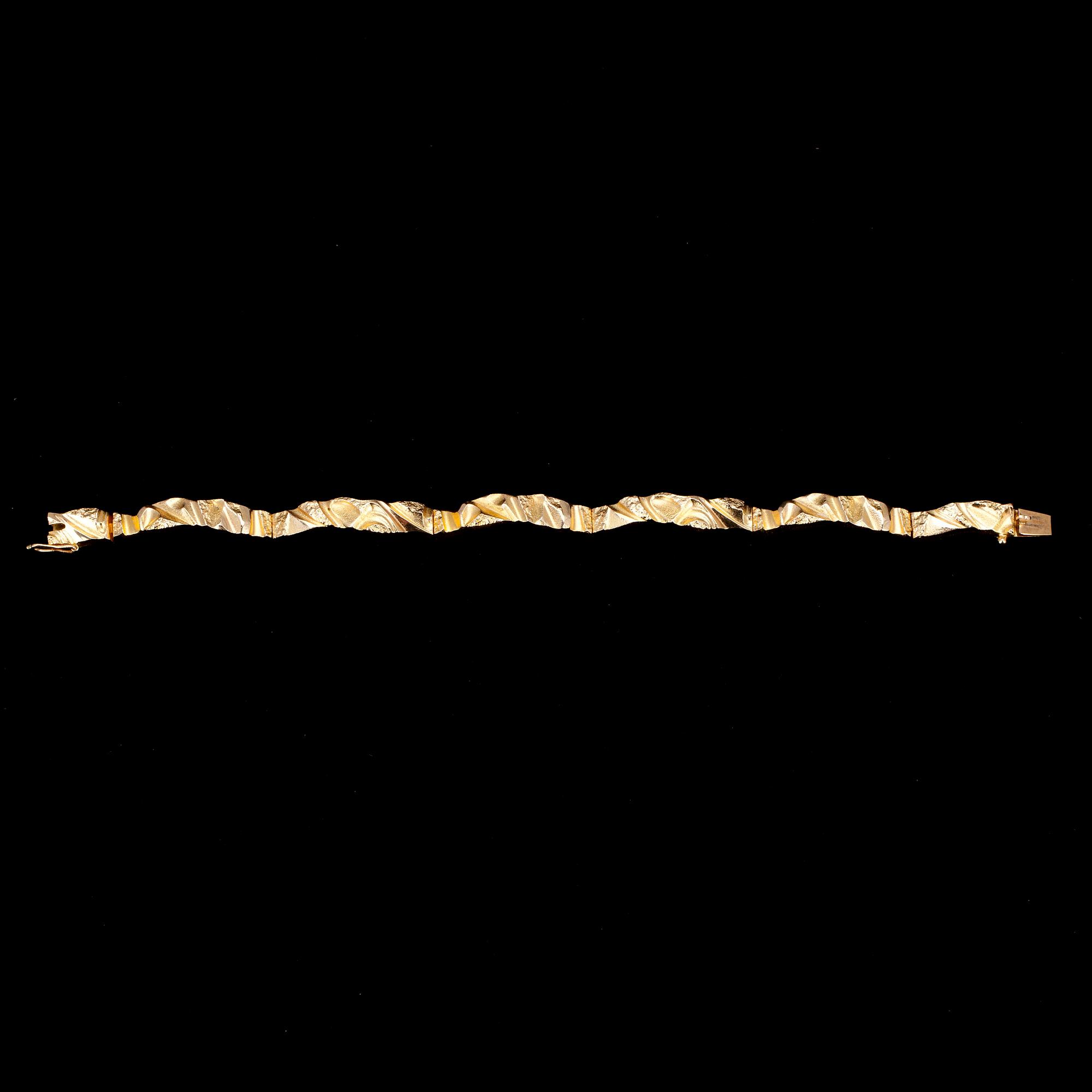 ARMSMYCKE, "Scintilla", guld 14K, Lapponia, Björn Weckström, vikt 21,7 g.