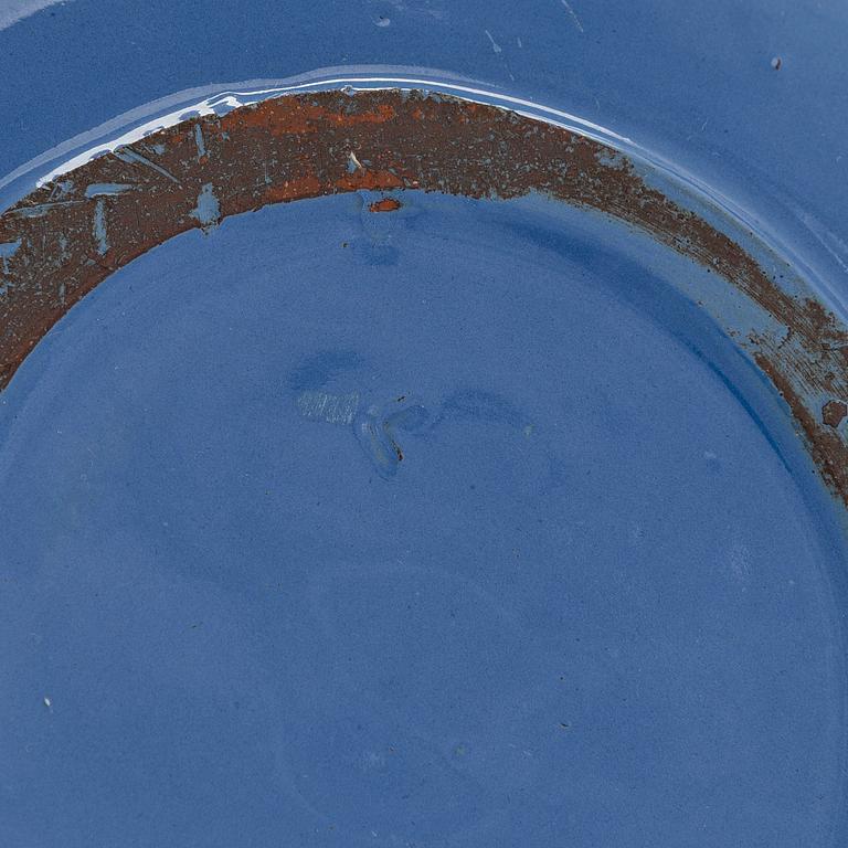 Marita Lybeck, a set of three ceramic plates and cream jug, red clay, signed ML.