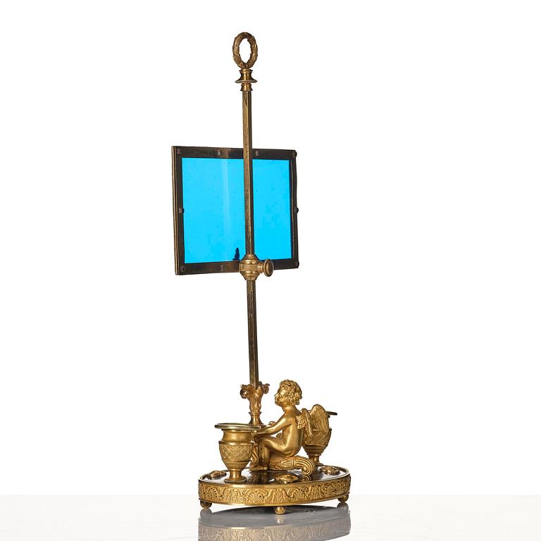 A Russian Empire ormolu and patinated bronse two-light lamp, early 19th century.