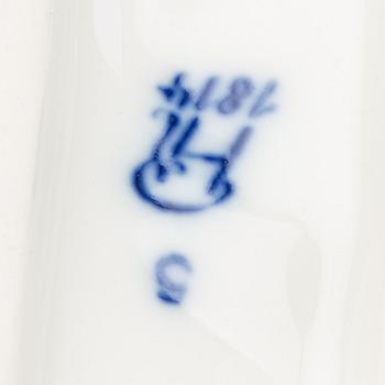 A PORCELAIN FIGURINE BY KARL TUTTER FOR HUTSCHENREUTER.