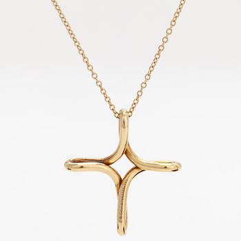 Tiffany & Co, Elsa Peretti, an 18K gold 'Infinity Cross' necklace.