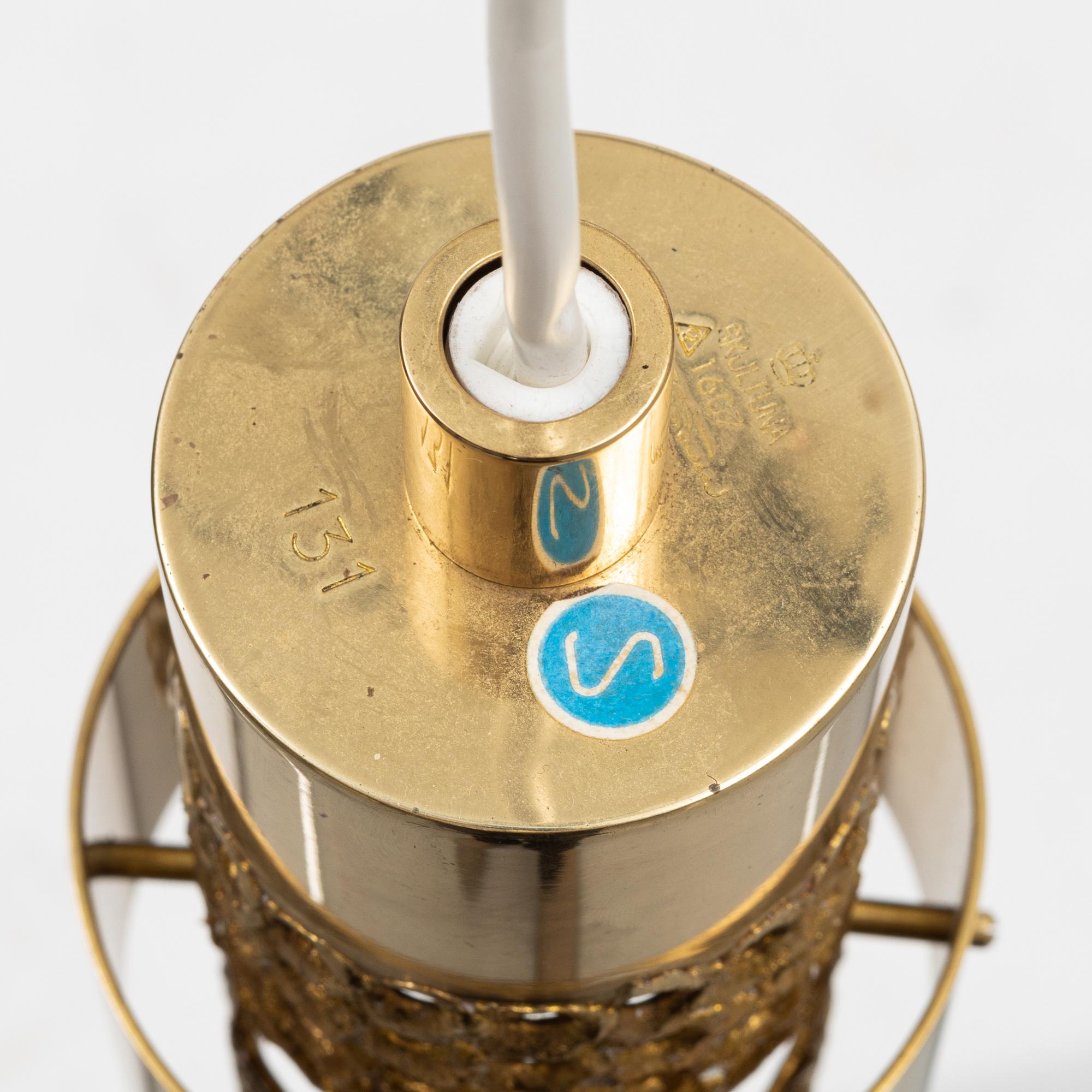 Pierre Forssell, a model 131 brass ceiling light, Skultuna, Sweden.