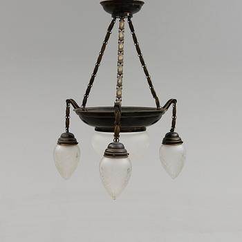 TAKLAMPA, 1900-talets första hälft.