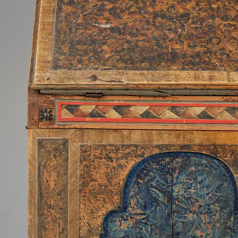 A polychrome-painted folk art cabinet from Värmland, Sweden, dated 1818.