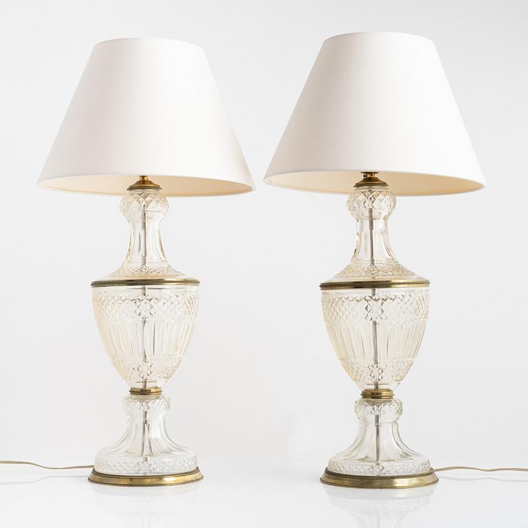 A pair of brass and glass table lamps, first half of the 20th century.