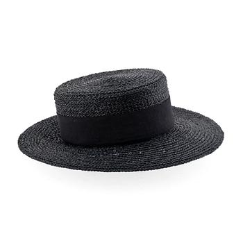CHANEL, a black straw hat.