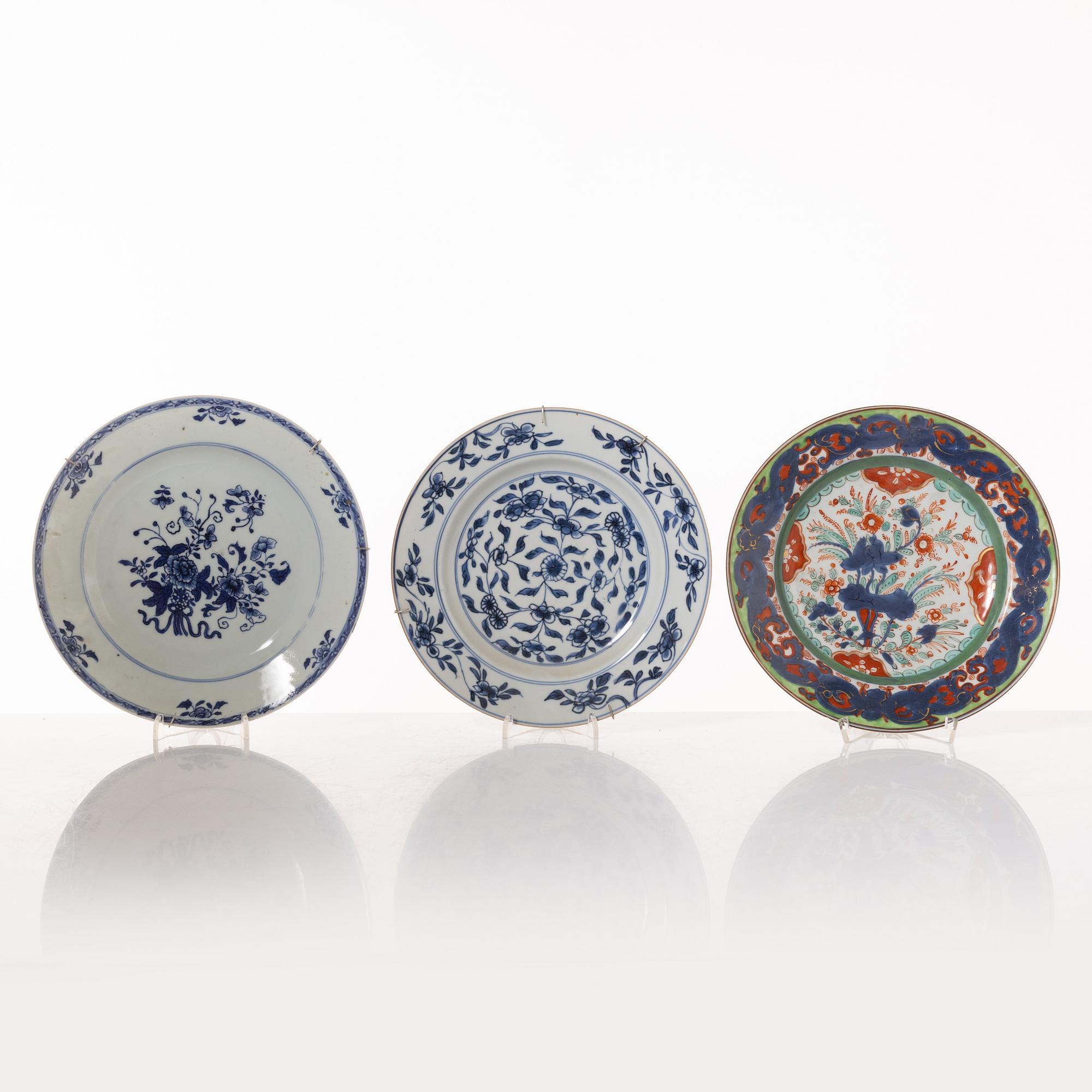 A group  of three serving dishes, a serving bowl, a cup, and seven plates, porcelain, including China 18th century.