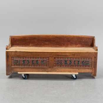 A painted Swedish wooden sofa, dated 1845.