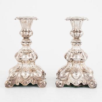A pair of silver candlesticks and a bowl, including GAB, Stockholm 1933.