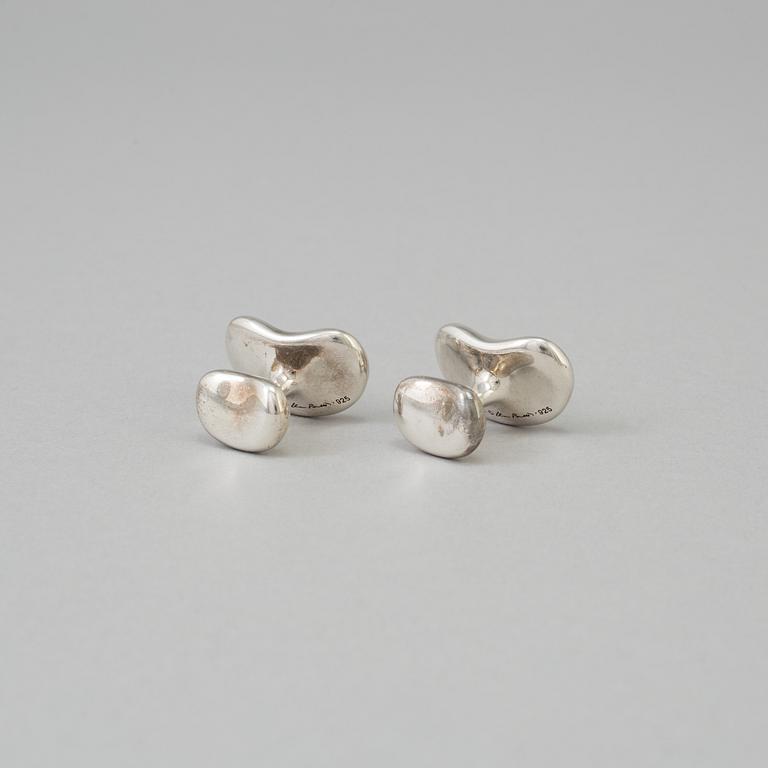 A pair of sterling cufflinks by Elsa Peretti for Tiffany & co.