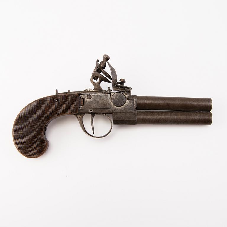 A late 18th Century, probably British double-barrelled flintlock pistol.