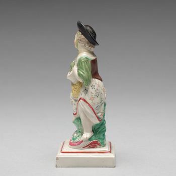 An English creamware figure representing Autumn, circa 1800.