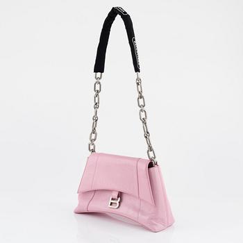 Balenciaga, a pink leather 'Downtown' bag.