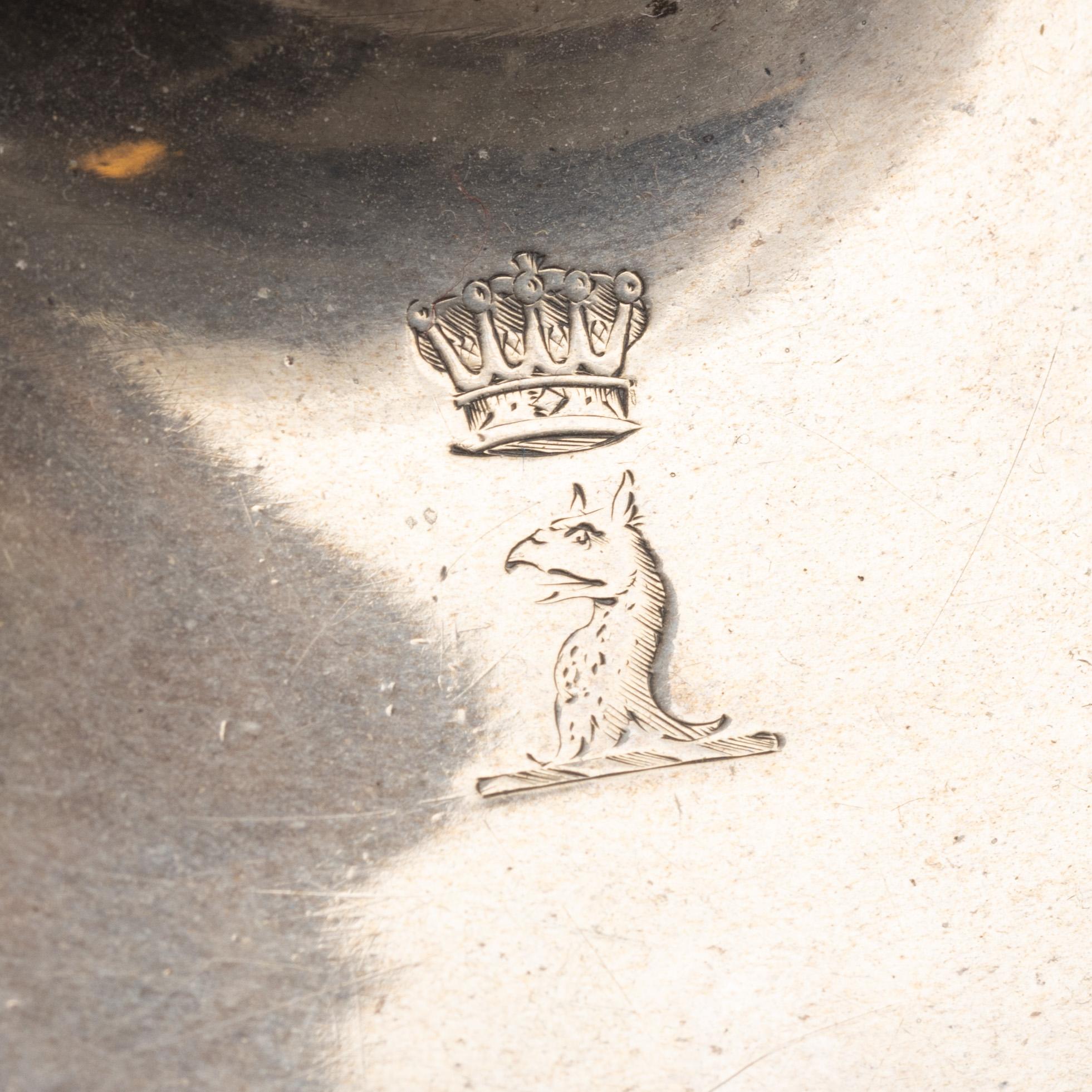 A silver chamber candlestick with mark of R & S Garrard & Co, London, England 1848.