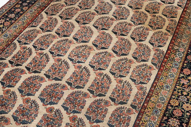 A Bakhtiari carpet, signed, c. 580 x 212 cm.