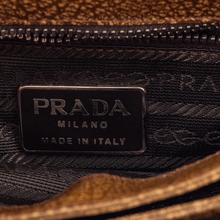 Prada, a brandy colored bag.