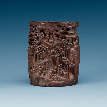 A wooden brush pot, late Qing dynasty (1644-1912).