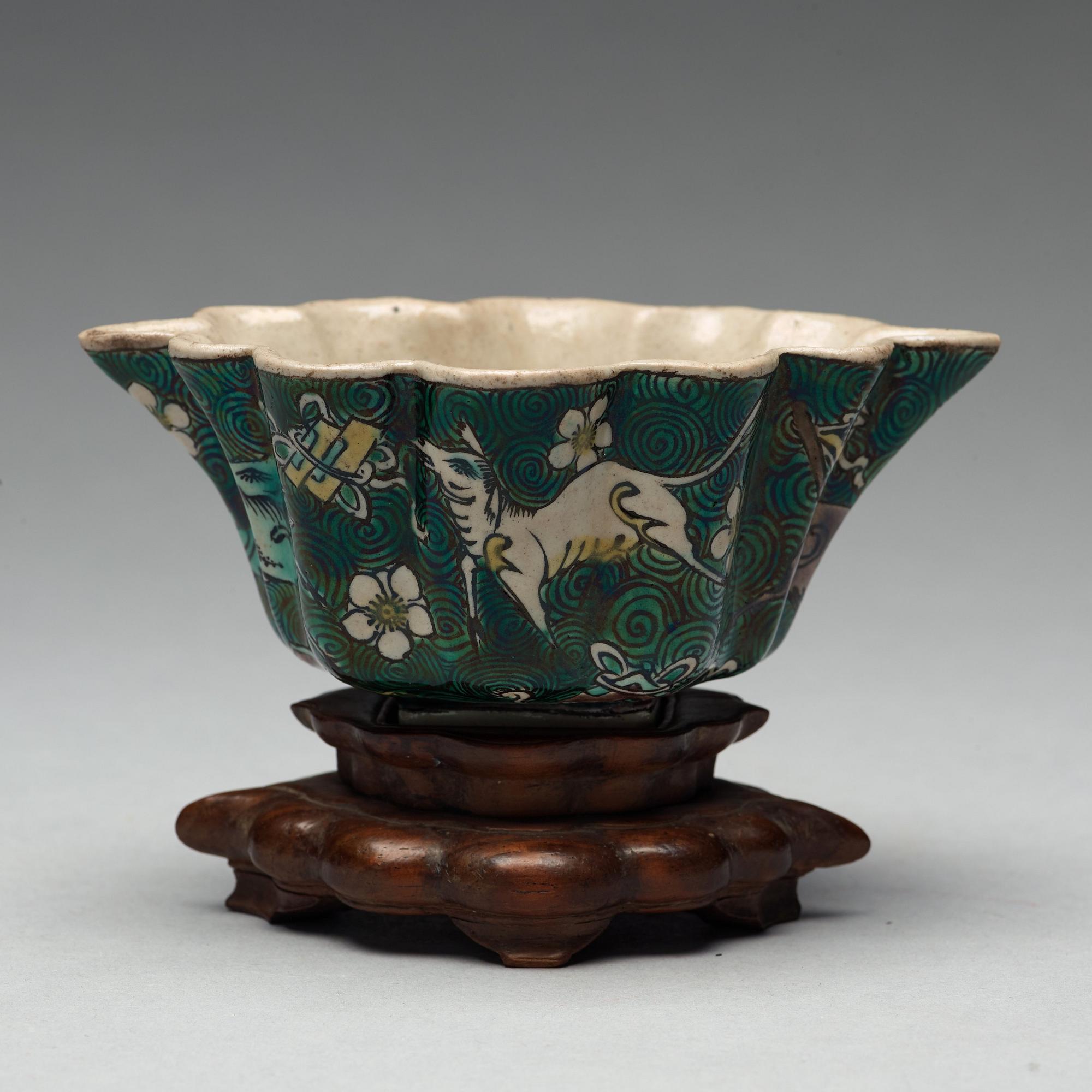 A famille verte bisquit cup, Qing dynasty, 17th century.